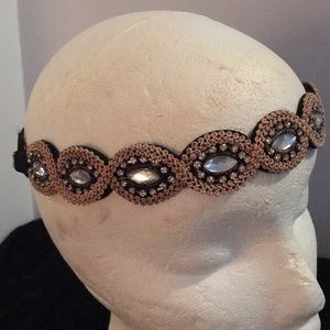 Gold tone braided and faux rhinestones stretch headband